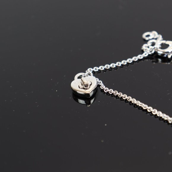 Coach Jewelry - 91403 PAVE TURNLOCK HEART BRACELET